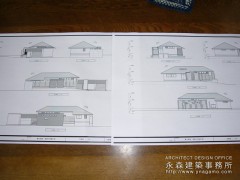 建築模型を手渡し